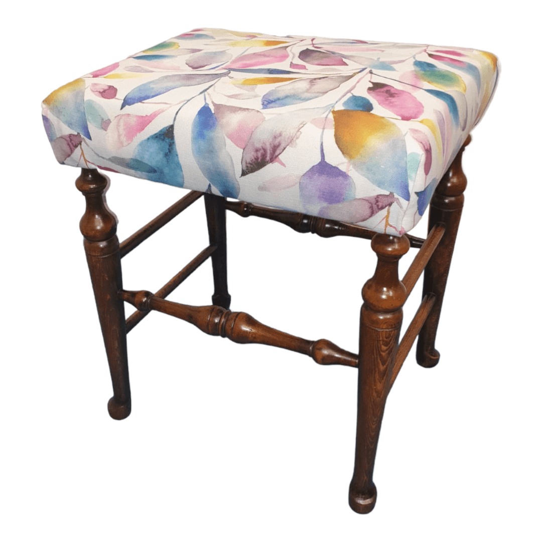 Oak stool reupholstered in cotton multi coloured leaf fabric - Image 4
