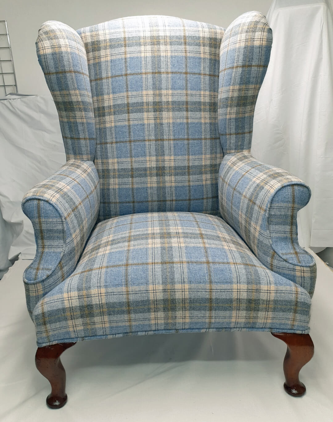 wing back chair in tartan fabric